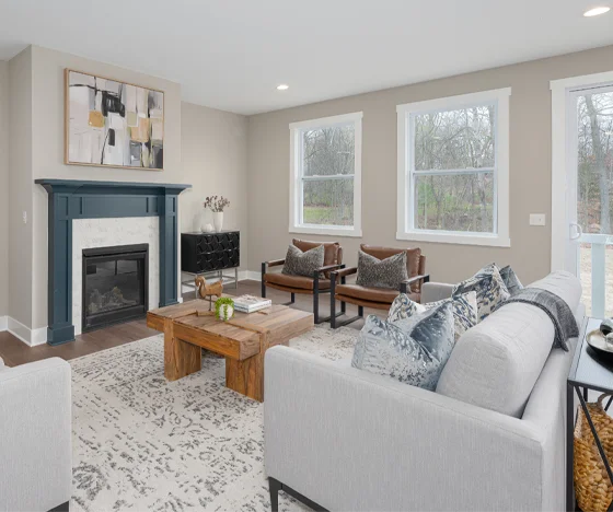 living room renovation with blue fireplace mantel